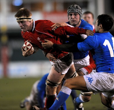 22.02.08 - Wales Under 20 v Italy Under 20 - Under 20 Six Nations - Wales' Nic Cudd is tackled by Andrea Bacchetti 
