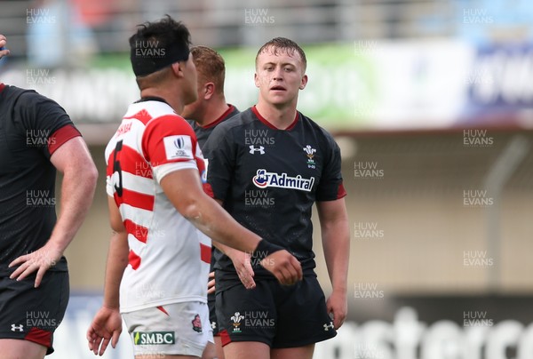 070618 -  Wales U20 v Japan U20, World Rugby U20 Championship, Pool A - Tommy Reffell of Wales with Ryuga Hashimoto of Japan at the end of the match