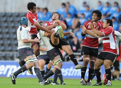10.06.08 - Wales Under 20s v Japan Under 20s - IRB Junior World Championship - Japan's Ryuhei Arita is tackled by Sam Warburton 