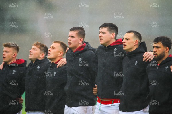 290623 - Wales v Japan - World Rugby U20 Championship - Evan Hill of Wales and Jonny Green of Wales sings the Welsh national anthem with his team mates