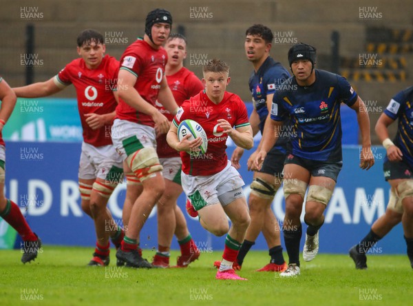 290623 - Wales v Japan - World Rugby U20 Championship - Archie Hughes of Wales breaks from the pack