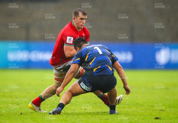 290623 - Wales v Japan - World Rugby U20 Championship - Morgan Morse of Wales runs into Hwang Sena of Japan
