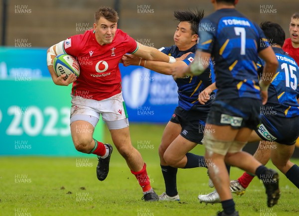 290623 - Wales v Japan - World Rugby U20 Championship - Tom Florence of Wales breaks through the backline