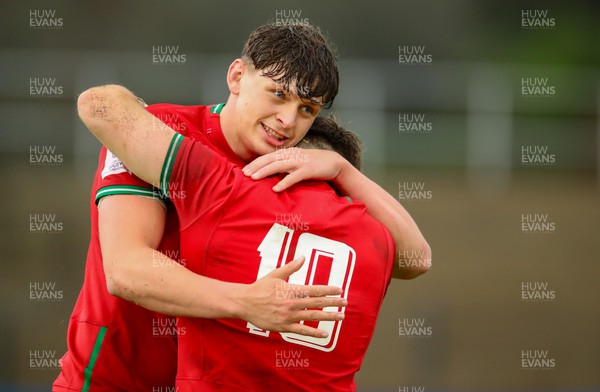 290623 - Wales v Japan - World Rugby U20 Championship - Ryan Woodman captain of Wales congratulates his team mate, Dan Edwards after he scored a try