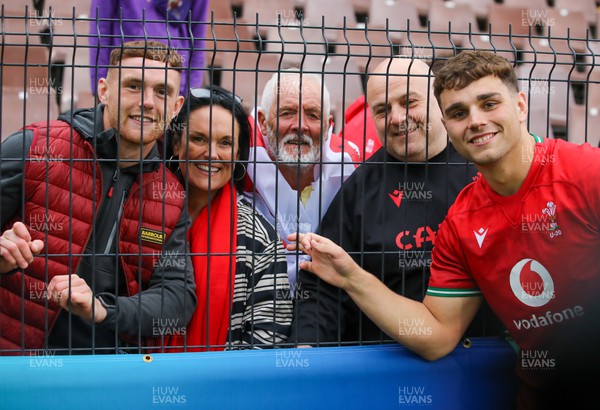 290623 - Wales v Japan - World Rugby U20 Championship - Lewis Lloyd of Wales with his family after the match
