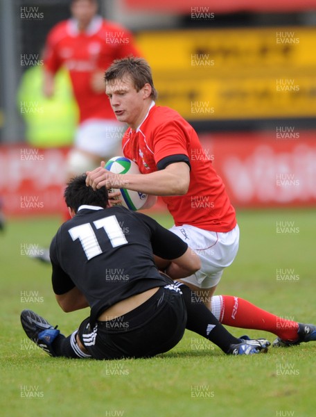 18.06.08 - Wales Under 20 v New Zealand Under 20 - Junior World Championship 2008 - Wales' Dan Biggar is tackled by New Zealand's Sean Maitland. 