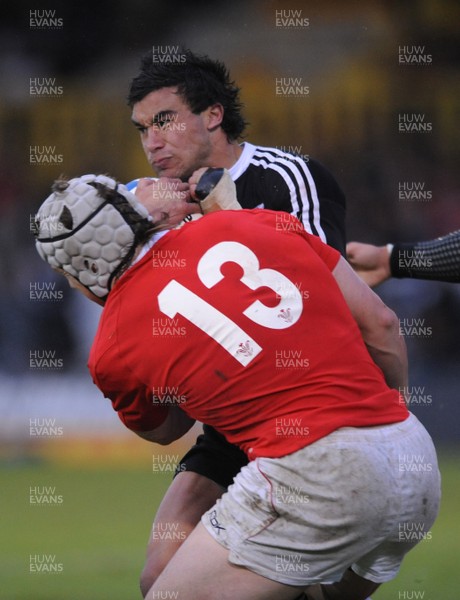 18.06.08 - Wales Under 20 v New Zealand Under 20 - Junior World Championship 2008 - New Zealand's Kade Poki is tackled by Wales' Jonathan Davies. 