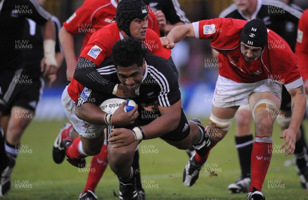 18.06.08 - Wales Under 20 v New Zealand Under 20 - Junior World Championship 2008 - New Zealand's Paea Fa'anunu is tackled by Luke Ford. 