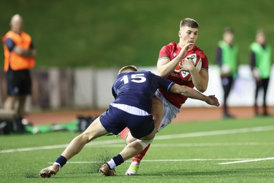 020224 - Wales v Scotland, U20 6 Nations 2024 - Harry Rees-Weldon of Wales takes on Fergus Watson of Scotland