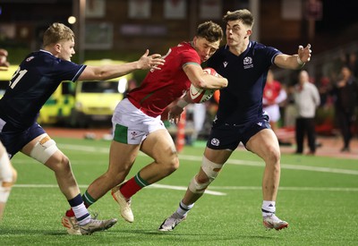 020224 - Wales v Scotland, U20 6 Nations 2024 - Louie Hennessey of Wales is tackled