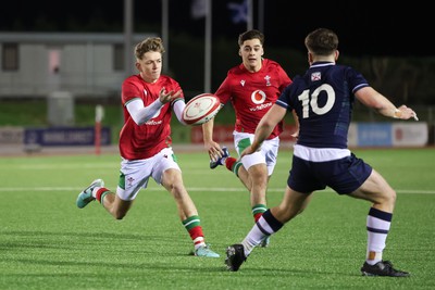 020224 - Wales v Scotland, U20 6 Nations 2024 - Harri Ford of Wales feeds the ball out to Walker Price of Wales to score his second try