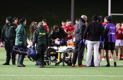 020224 - Wales v Scotland, U20 6 Nations 2024 - Tom Currie of Scotland receives treatment before being stretchered off