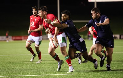 020224 - Wales v Scotland, U20 6 Nations 2024 - Harri Ackerman of Wales offloads as he is tackled