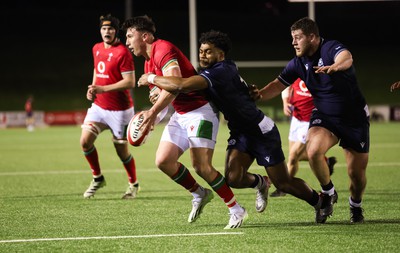 020224 - Wales v Scotland, U20 6 Nations 2024 - Harri Ackerman of Wales offloads as he is tackled