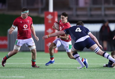 020224 - Wales v Scotland, U20 6 Nations 2024 -Huw Anderson of Wales takes on Euan McVie of Scotland