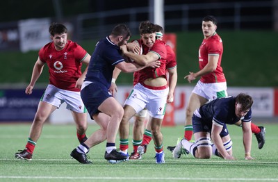 020224 - Wales v Scotland, U20 6 Nations 2024 -Huw Anderson of Wales is held