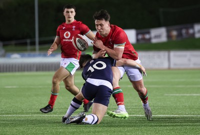 020224 - Wales v Scotland, U20 6 Nations 2024 - Harri Ackerman of Wales is tackled by Isaac Coates of Scotland