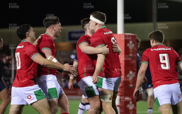 020224 - Wales v Scotland, U20 6 Nations 2024 - Morgan Morse of Wales celebrates with team mates after scoring try