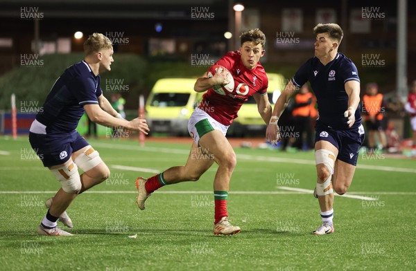 020224 - Wales v Scotland, U20 6 Nations 2024 - Louie Hennessey of Wales is tackled