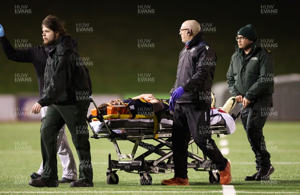 020224 - Wales v Scotland, U20 6 Nations 2024 - Tom Currie of Scotland is stretchered from the pitch