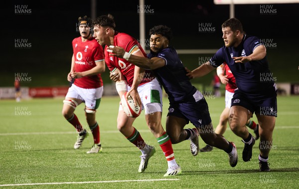 020224 - Wales v Scotland, U20 6 Nations 2024 - Harri Ackerman of Wales offloads as he is tackled