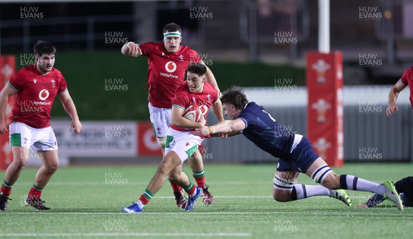 020224 - Wales v Scotland, U20 6 Nations 2024 -Huw Anderson of Wales takes on Euan McVie of Scotland