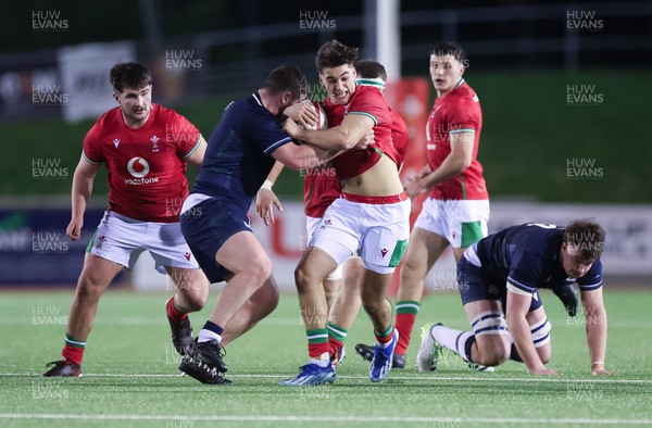 020224 - Wales v Scotland, U20 6 Nations 2024 -Huw Anderson of Wales is held