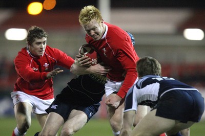 08.02.08 ... Wales U20 v Scotland U20, Newport -  Wales' Jimmy Norris drives into Scotlands' Tom Bury 