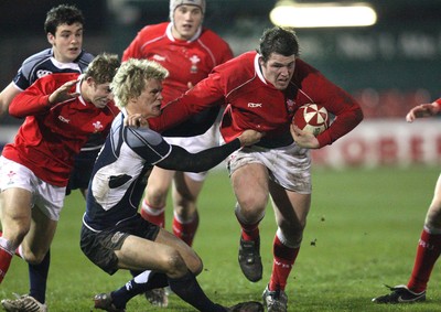 08.02.08 ... Wales U20 v Scotland U20, Newport -  Wales' Ryan Bevington hands off Scotlands' Chris Kinloch 