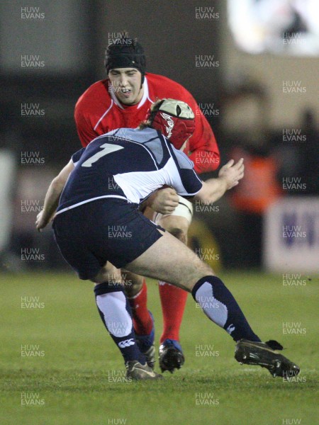 08.02.08 ... Wales U20 v Scotland U20, Newport -  Wales' Josh Turnbull drives into Scotlands' Lewis Calder 