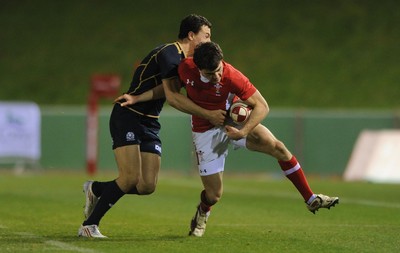 100212 - Wales Under 20 v Scotland Under 20 - Under 20 Six Nations -Luke Morgan of Wales is tackled by Jamie Farndale of Scotland