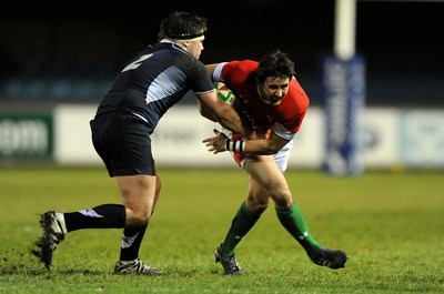 12.02.10 - Wales Under 20 v Scotland Under 20 - Under 20 Six Nations - Rhys Downes of Wales takes on Alun Walker of Scotland. 