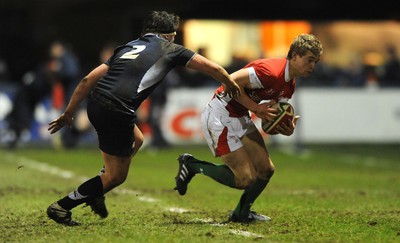 12.02.10 - Wales Under 20 v Scotland Under 20 - Under 20 Six Nations - Owen Williams of Wales takes on Alun Walker of Scotland. 