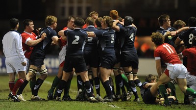12.02.10 - Wales Under 20 v Scotland Under 20 - Under 20 Six Nations - Wales and Scotland players exchange blows. 