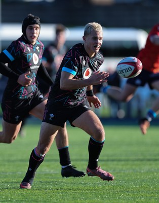 121225 - Wales U20 v Scotland U20, International Friendly - Evan Morris of Wales races in to score try