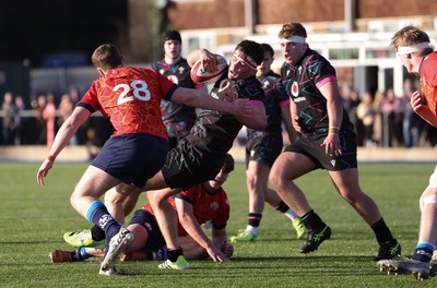 121225 - Wales U20 v Scotland U20, International Friendly - Tom Howe of Wales is tackled short of the line