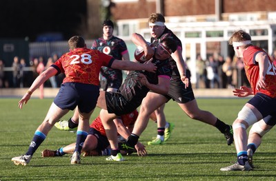 121225 - Wales U20 v Scotland U20, International Friendly - Tom Howe of Wales is tackled short of the line
