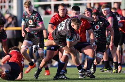 121225 - Wales U20 v Scotland U20, International Friendly - Jack Hoskins of Wales is tackled