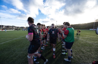 121225 - Wales U20 v Scotland U20, International Friendly - The Wales team are applauded off the pitch by Scotland at the end of the match