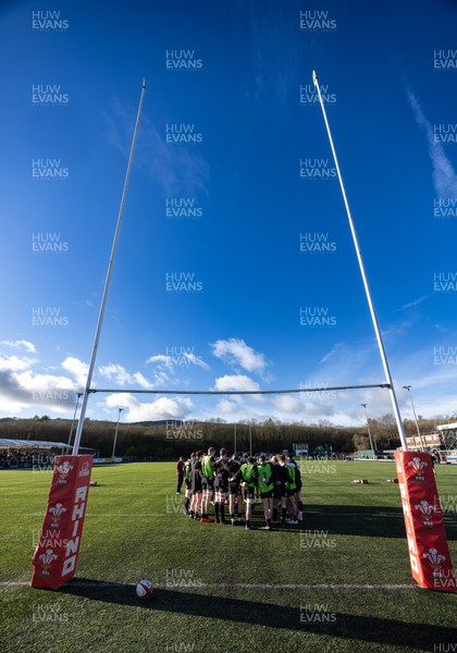 121225 - Wales U20 v Scotland U20, International Friendly - The Wales team warm up at the start of the match