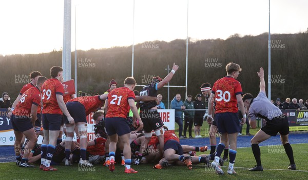 121225 - Wales U20 v Scotland U20, International Friendly - Wales drive over for Evan Minto of Wales to score