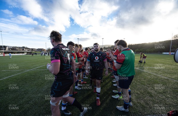 121225 - Wales U20 v Scotland U20, International Friendly - The Wales team are applauded off the pitch by Scotland at the end of the match
