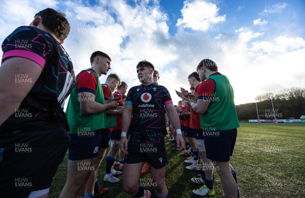 121225 - Wales U20 v Scotland U20, International Friendly - The Wales team are applauded off the pitch by Scotland at the end of the match