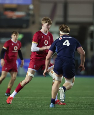 200226 - Wales U20 v Scotland U20, 2026 U20 Six Nations - Osian Williams of Wales takes on Christian Lindsay of Scotland