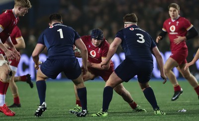 200226 - Wales U20 v Scotland U20, 2026 U20 Six Nations - Tom Howe of Wales takes on Jamie Stewart of Scotland and Ollie Blyth-Lafferty of Scotland