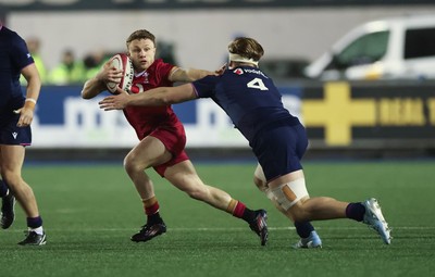 200226 - Wales U20 v Scotland U20, 2026 U20 Six Nations - Tom Bowen of Wales takes on Christian Lindsay of Scotland’