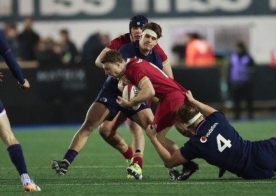 200226 - Wales U20 v Scotland U20, 2026 U20 Six Nations - Tom Bowen of Wales takes on Christian Lindsay of Scotland’