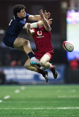 200226 - Wales U20 v Scotland U20, 2026 U20 Six Nations - Tom Bowen of Wales and Nairn Moncrieff of Scotland compete for the ball