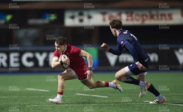 200226 - Wales U20 v Scotland U20, 2026 U20 Six Nations - Carwyn Leggatt-Jones of Wales takes on Jake Dalziel of Scotland