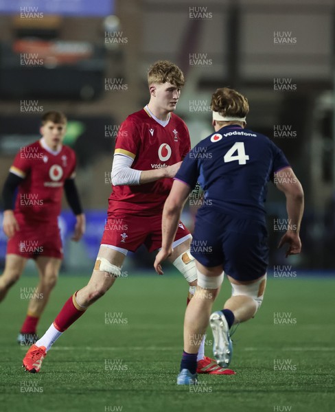 200226 - Wales U20 v Scotland U20, 2026 U20 Six Nations - Osian Williams of Wales takes on Christian Lindsay of Scotland